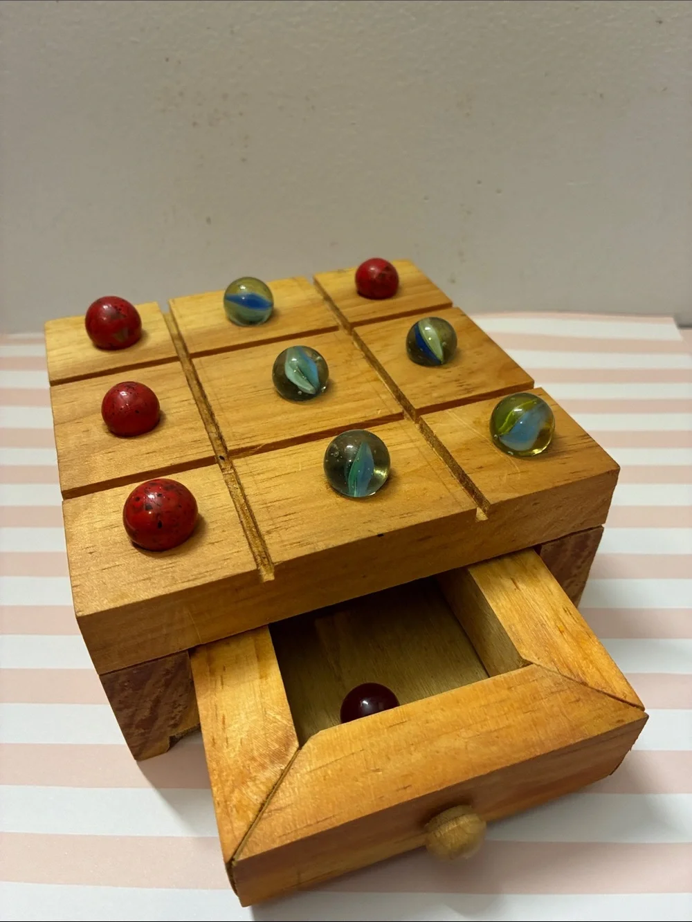 Homemade tic tac toe marble game